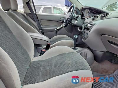 Zdjęcie 7 z 12 samochodu: 2002 FORD FOCUS ZX5 VIN:3FAHP37392R204031 - miniatura