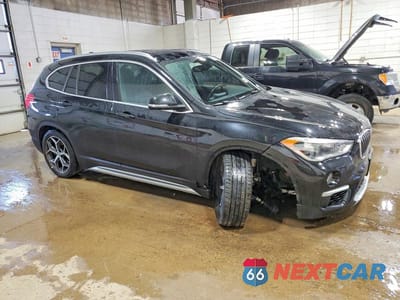 Czwarte zdjęcie samochodu z boku: 2018 BMW X1 XDRIVE28I VIN:WBXHT3C30J5L31766 - miniatura