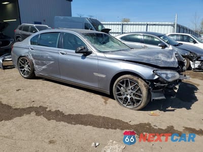 Czwarte zdjęcie samochodu z boku: 2013 BMW 750 LXI VIN:WBAYF8C53DD140398 - miniatura