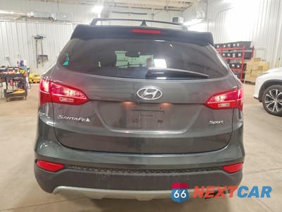 Zdjęcie 6 z 12 samochodu: 2014 HYUNDAI SANTA FE SPORT 2.4L VIN:5XYZU3LB9EG178226 - miniatura