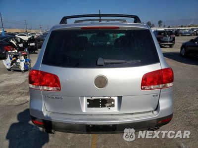 Zdjęcie 6 z 12 samochodu: 2006 VOLKSWAGEN TOUAREG 4.2 VIN:WVGZM77L16D054733 - miniatura