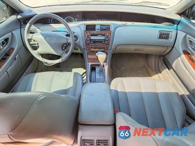 Zdjęcie 8 z 12 samochodu: 2001 TOYOTA AVALON XLS VIN:4T1BF28B71U190233 - miniatura