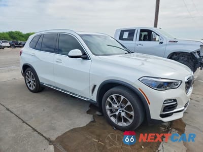 Czwarte zdjęcie samochodu z boku: 2021 BMW X5 XDRIVE45E VIN:5UXTA6C03M9E21366 - miniatura