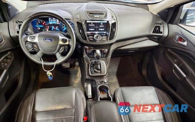 Zdjęcie 8 z 13 samochodu: 2014 FORD ESCAPE TITANIUM VIN:1FMCU0J95EUB07197 - miniatura