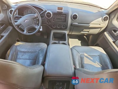 Zdjęcie 8 z 14 samochodu: 2003 FORD EXPEDITION XLT VIN:1FMPU16L33LA22616 - miniatura