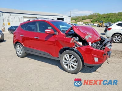 Czwarte zdjęcie samochodu z boku: 2012 HYUNDAI TUCSON LIMITED VIN:KM8JU3AC4CU511013 - miniatura