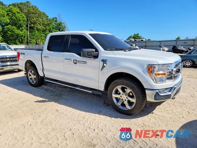 Czwarte zdjęcie samochodu z boku: 2023 FORD F150 SUPERCREW VIN:1FTFW1E53PFB25777 - miniatura