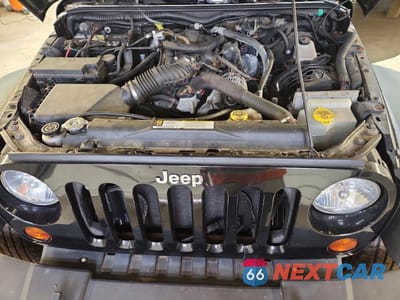 Zdjęcie 11 z 12 samochodu: 2010 JEEP WRANGLER SPORT VIN:1J4AA2D19AL162395 - miniatura