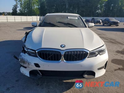 Piąte zdjęcie samochodu w środku: 2021 BMW 330I VIN:3MW5R1J08M8B49863 - miniatura