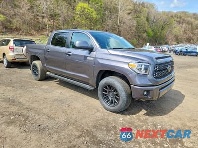 Czwarte zdjęcie samochodu z boku: 2021 TOYOTA TUNDRA PLATINUM VIN:5TFAY5F1XMX021073 - miniatura