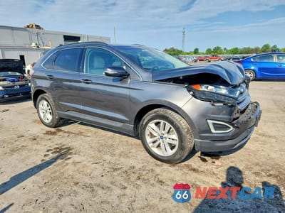 Czwarte zdjęcie samochodu z boku: 2017 FORD EDGE SEL VIN:2FMPK4J94HBB47196 - miniatura