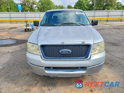 Piąte zdjęcie samochodu w środku: 2004 FORD F150 VIN:1FTRX12W24NA10239 - miniatura