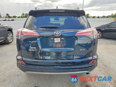 Zdjęcie 6 z 14 samochodu: 2018 TOYOTA RAV4 XLE VIN:JTMWFREV5JJ195848 - miniatura