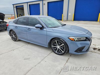 Czwarte zdjęcie samochodu z boku: 2024 HONDA CIVIC TOURING VIN:2HGFE1F90RH308402 - miniatura