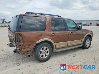 Trzecie zdjęcie samochodu z tyłu: 2011 FORD EXPEDITION XLT VIN:1FMJU1H5XBEF37524 - miniatura