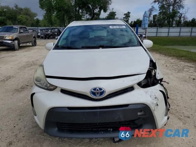 Piąte zdjęcie samochodu w środku: 2016 TOYOTA PRIUS V THREE VIN:JTDZN3EU5GJ044036 - miniatura
