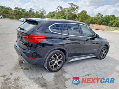 Trzecie zdjęcie samochodu z tyłu: 2016 BMW X1 XDRIVE28I VIN:WBXHT3Z33G4A48786 - miniatura