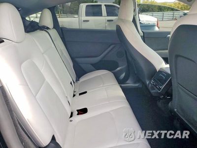 Zdjęcie 10 z 12 samochodu: 2023 TESLA MODEL Y VIN:7SAYGDEE8PA185890 - miniatura