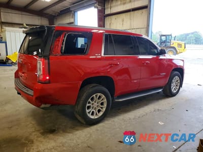 Trzecie zdjęcie samochodu z tyłu: 2017 GMC YUKON SLE VIN:1GKS1AKC3HR272976 - miniatura