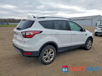 Trzecie zdjęcie samochodu z tyłu: 2018 FORD ESCAPE SEL VIN:1FMCU0HD0JUC79254 - miniatura