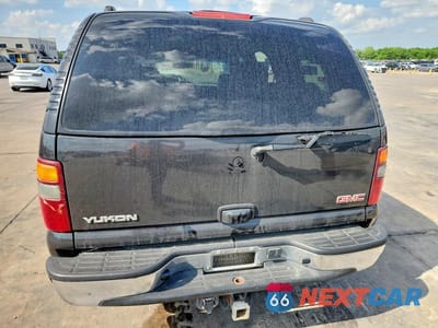Zdjęcie 6 z 13 samochodu: 2003 GMC YUKON VIN:1GKEC13ZX3J337291 - miniatura