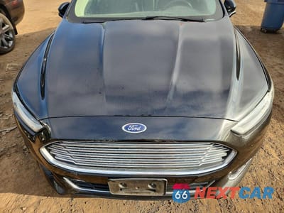 Zdjęcie 11 z 12 samochodu: 2014 FORD FUSION TITANIUM VIN:3FA6P0K95ER216568 - miniatura