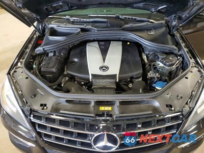 Zdjęcie 12 z 13 samochodu: 2013 MERCEDES-BENZ ML 350 BLUETEC VIN:4JGDA2EB4DA208253 - miniatura
