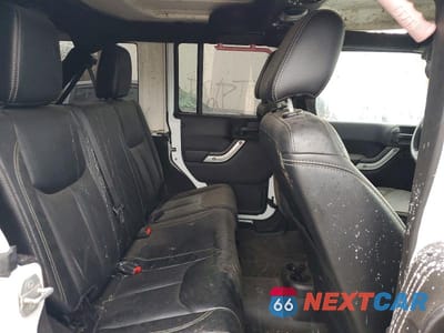 Zdjęcie 10 z 11 samochodu: 2016 JEEP WRANGLER UNLIMITED SAHARA VIN:1C4BJWEGXGL107869 - miniatura