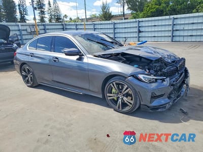 Czwarte zdjęcie samochodu z boku: 2022 BMW 330I VIN:3MW5R1J08N8C32565 - miniatura