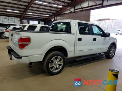 Trzecie zdjęcie samochodu z tyłu: 2014 FORD F150 SUPERCREW VIN:1FTFW1EF2EFD13129 - miniatura