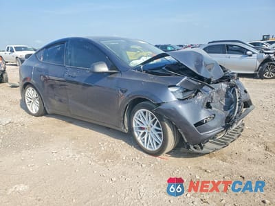 Czwarte zdjęcie samochodu z boku: 2024 TESLA MODEL Y VIN:7SAYGDEF5RA308377 - miniatura