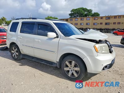 Czwarte zdjęcie samochodu z boku: 2014 HONDA PILOT TOURING VIN:5FNYF4H93EB025625 - miniatura