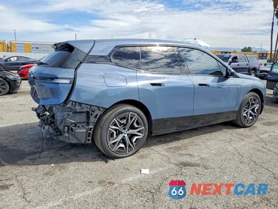 Trzecie zdjęcie samochodu z tyłu: 2024 BMW IX XDRIVE50 VIN:WB523CF04RCR06118 - miniatura