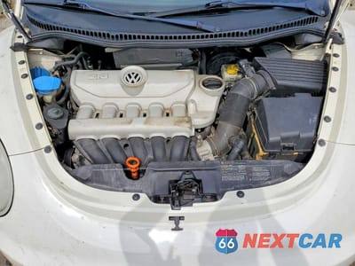 Zdjęcie 11 z 12 samochodu: 2008 VOLKSWAGEN NEW BEETLE TRIPLE WHITE VIN:3VWFG31CX8M510779 - miniatura