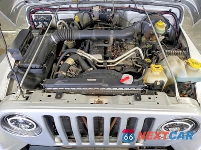 Zdjęcie 11 z 12 samochodu: 2003 JEEP WRANGLER COMMANDO/X VIN:1J4FA39SX3P374456 - miniatura