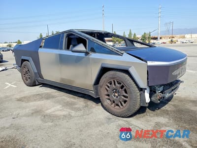 Czwarte zdjęcie samochodu z boku: 2024 TESLA CYBERTRUCK VIN:7G2CEHED0RA018368 - miniatura