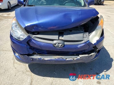 Zdjęcie 12 z 13 samochodu: 2011 HYUNDAI TUCSON GLS VIN:KM8JU3AC0BU129124 - miniatura