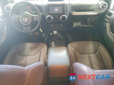 Zdjęcie 8 z 12 samochodu: 2013 JEEP WRANGLER UNLIMITED SAHARA VIN:1C4BJWEG3DL585465 - miniatura