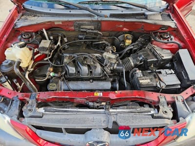 Zdjęcie 12 z 13 samochodu: 2003 MAZDA TRIBUTE ES VIN:4F2CZ06163KM45676 - miniatura