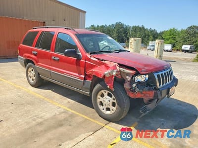 Czwarte zdjęcie samochodu z boku: 2003 JEEP GRAND CHEROKEE LAREDO VIN:1J4GX48S23C571834 - miniatura