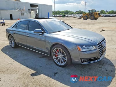 Czwarte zdjęcie samochodu z boku: 2015 AUDI A8 L QUATTRO VIN:WAU32AFD9FN031683 - miniatura