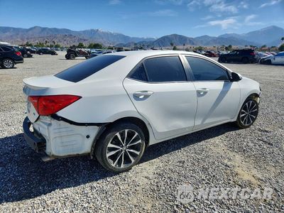 Trzecie zdjęcie samochodu z tyłu: 2018 TOYOTA COROLLA L VIN:5YFBURHE6JP816400 - miniatura