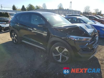 Czwarte zdjęcie samochodu z boku: 2017 HYUNDAI TUCSON LIMITED VIN:KM8J33A24HU483974 - miniatura