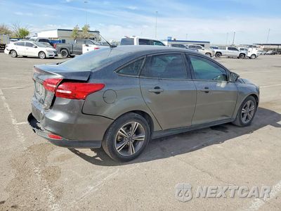 Trzecie zdjęcie samochodu z tyłu: 2017 FORD FOCUS SE VIN:1FADP3FE2HL276682 - miniatura