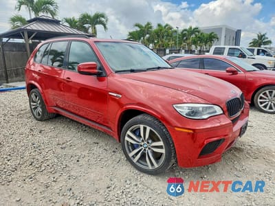Czwarte zdjęcie samochodu z boku: 2013 BMW X5 M VIN:5YMGY0C59D0C11700 - miniatura