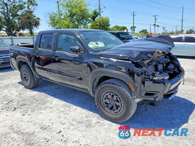 Czwarte zdjęcie samochodu z boku: 2026 NISSAN FRONTIER PRO-4X VIN:1N6ED1EK7TN633366 - miniatura