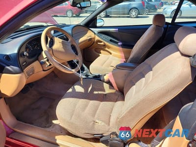 Zdjęcie 7 z 12 samochodu: 1996 FORD MUSTANG VIN:1FALP444XTF163081 - miniatura