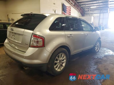 Trzecie zdjęcie samochodu z tyłu: 2010 FORD EDGE SEL VIN:2FMDK3JC1ABB17183 - miniatura
