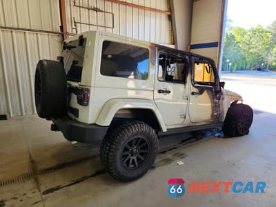 Trzecie zdjęcie samochodu z tyłu: 2011 JEEP WRANGLER UNLIMITED SAHARA VIN:1J4BA5H12BL571856 - miniatura