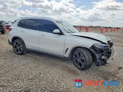 Czwarte zdjęcie samochodu z boku: 2020 BMW X5 SDRIVE 40I VIN:5UXCR4C00L9D56830 - miniatura